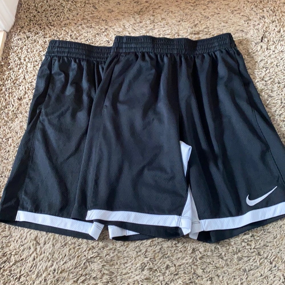 Two pair of dri fit Nike shorts